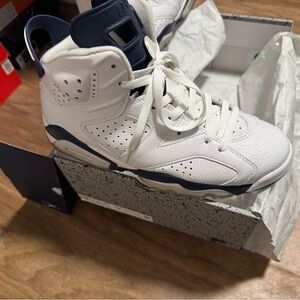 Jordan White and Blue High-Top Sneakers with Perforated Design